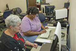 Instructor and student in the Keyboarding class